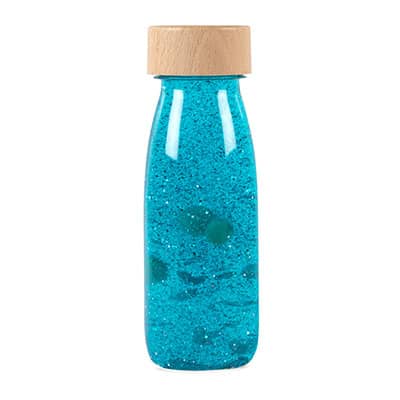 Bouteille sensorielle Float Turquoise de Petit Boum, vendu par Rêves de fil.